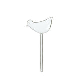 Dispositivo de riego automático en maceta de plantas verdes