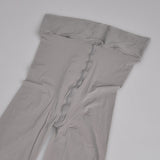 Pantimedias aceitosas súper transparentes de primera línea en la entrepierna