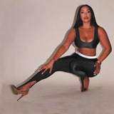 Leggings brillantes con paso frontal