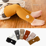 Mallas de bebé con bordado de margaritas pequeñas