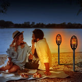 Altavoces de llama LED Antorcha Altavoz inalámbrico Altavoz de graves estéreo a prueba de agua Altavoz iluminado para exteriores Atmósfera Parpadeo LED Luz nocturna Luces de estaca para patio Linterna para fiesta Acampar