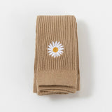 Mallas de bebé con bordado de margaritas pequeñas