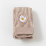 Mallas de bebé con bordado de margaritas pequeñas